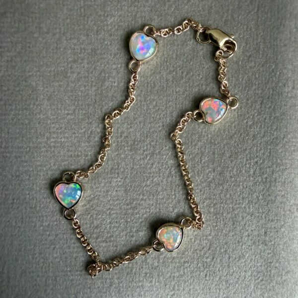 14K Yellow gold bracelet with Australian Opals Hearts